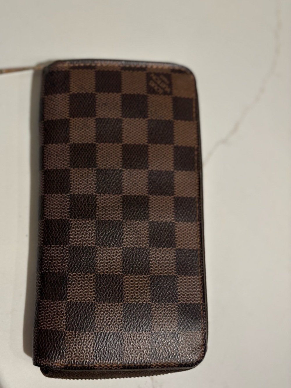 Louis Vuitton
Damier‎ Ebene Pattern Coated Canvas